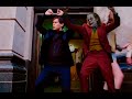 Joker dancing with bully Maguire in the streets of New York
