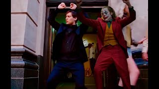 Joker dancing with bully Maguire in the streets of New York