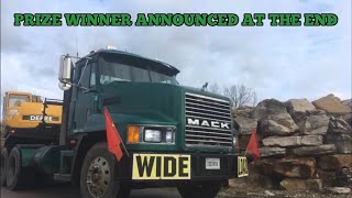 Hauling John Deere 120 excavator