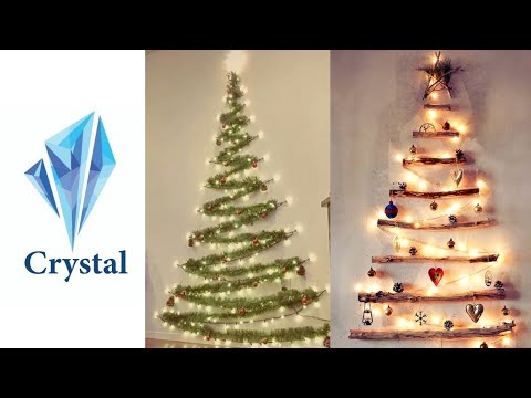 فيديو: صنع شجرة عيد الميلاد الجميلة على الحائط من الزينة والأكاليل