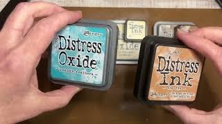 What in the world is the difference? Tim Holtz Distress Inks vs Distress Oxides
