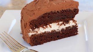 This sour cream chocolate cake is moist and delicious. it has two
layers of frosting, white with chips in the middle. visit my websit...