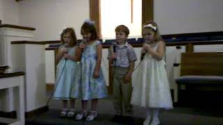 Zoe and friends singing Easter morning, 2010.
