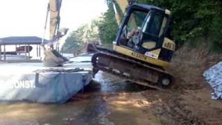 Loading Excavator Onto Barge