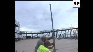 Tropical Storm Hanna rattled the tourist beaches of the Carolinas as its center 