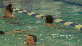 Kids dive for prizes for the State College YMCA underwater egg hunt