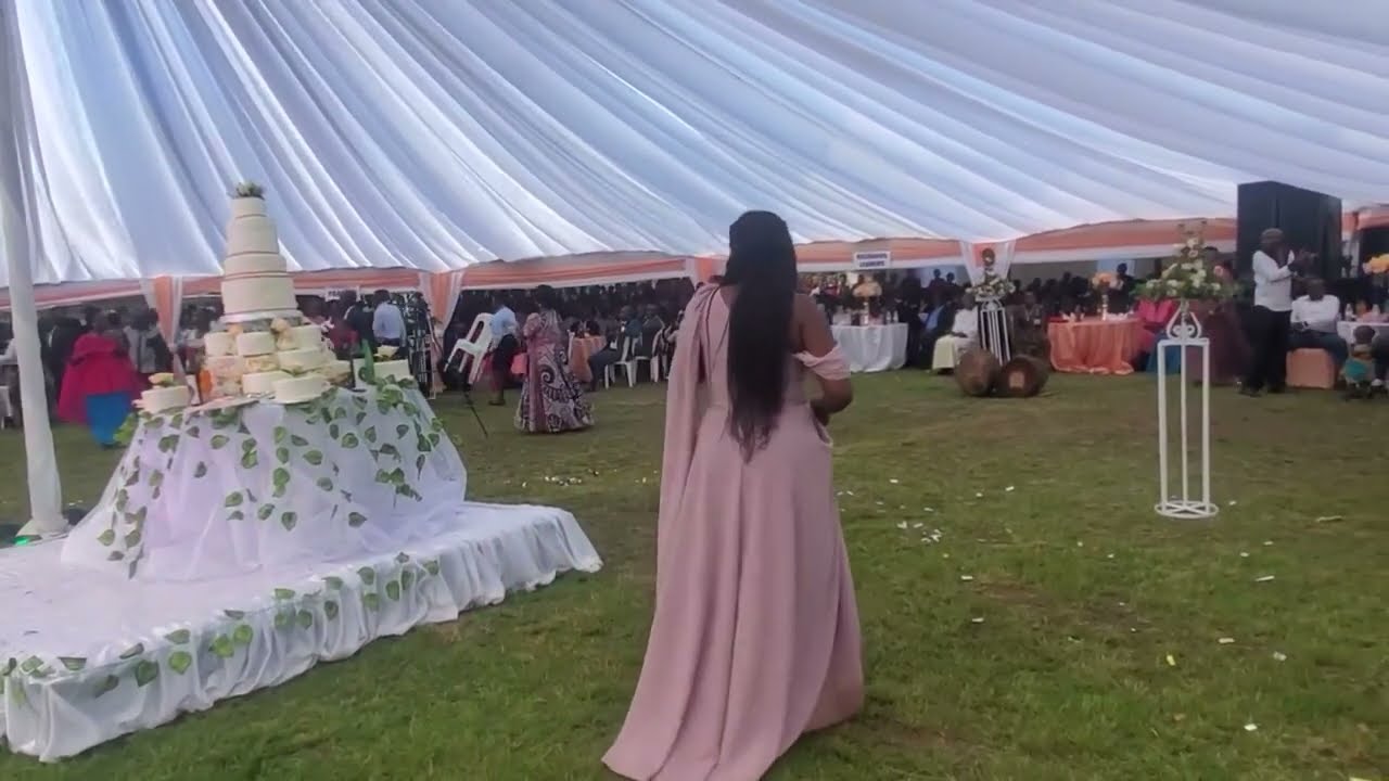 Hon Roland Bish MP Rukiga dances with Lillian  as Viane weds Christine(Calendar yaawe & mukundane)