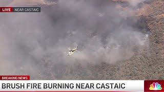 Firefighters battling small brush fire near the 5 Freeway in Castaic