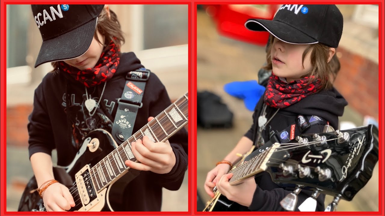 Cool kid Olly amazes crowd/first busk of 2023/ Guitar Shadows/ AC/DC ...