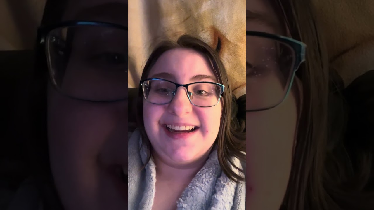 Watching the ball drop on tv talking about the new year 