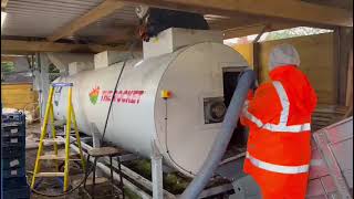 Compost tank cleaning using jetvac and vacuum tankers