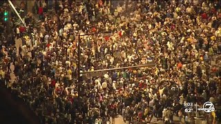 5 people remain hospitalized, 2 suspects in custody in Denver mass shooting that injured 10