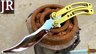 Turning a rusty bearing into a shiny but razor sharp karambit