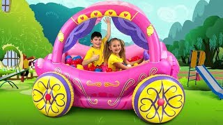 Sasha play with Inflatable Princess Carriage toy