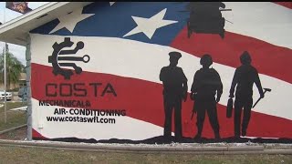 Artist told to stop painting due to city code violation