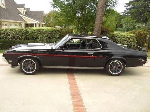 1969 Cougar, half restoration of an early 80s hacked up race car