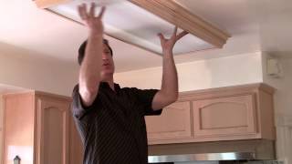 Wood framed fluorescent light fixtures