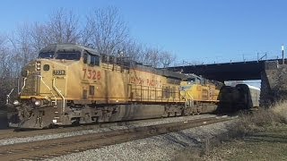 UP 7328 With SD70ACe & C41-8W Leads Vehicle Train