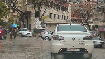 تحت المطر بشوارع مشتى الحلو - مع اغاني فيروز ...
