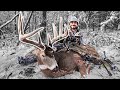 Iowa bow buck in a winter wonderland