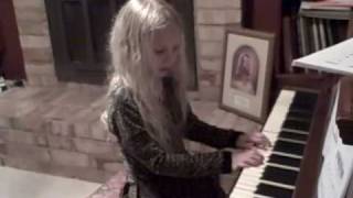 Von Behr playing piano