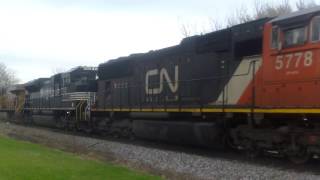 1,600th video!!!!!!!! UP 7718 leads NYC heritage unit and CN SD75I on EB CN M338