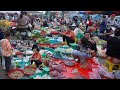 Cambodian Early Morning Market - Daily Lifestyle of Vendors Selling Some Food in Early Morning