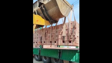The process of unloading bricks with a forklift