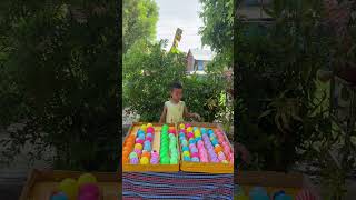 The small smart boy in puzzles colors balls