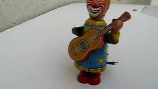 TIN WIND UP CLOWN PLAYS GUITAR BY KOHLER GERMANY