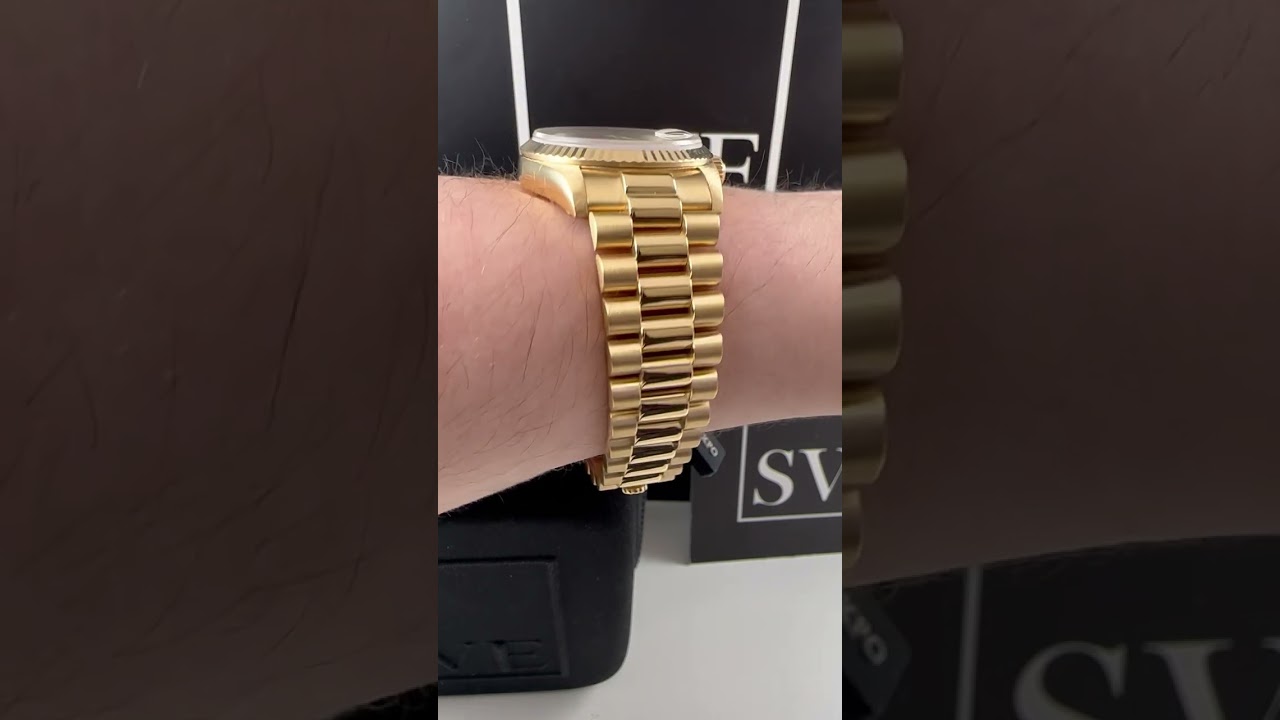 Rolex President Midsize Yellow Gold MOP Ruby Myriad Dial 68278 Wrist Roll | SwissWatchExpo