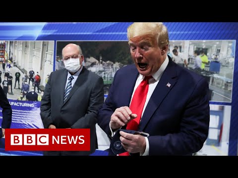 Trump removes mask before facing cameras at factory – BBC News