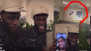 Burna boy Pay Respect to Davido and Wizkid as he Put their Pictures in his House during live