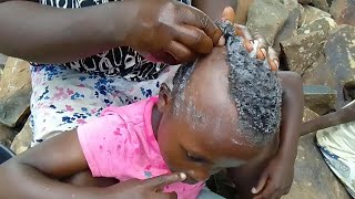 African Village way of shaving Hair Using a Razor Blade