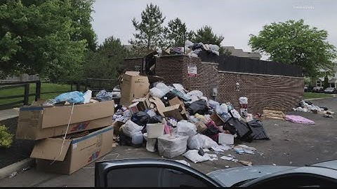 Apartment residents concerned about overflowing trash