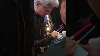 Jensen Huang, CEO NVIDIA signs the ZutaCore® HyperCool® cold plate for the GB200 super chip.