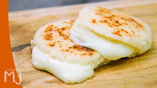 Arepas stuffed with cheese and parrot eggs