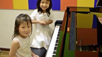 Aureus Academy Student Features: Cara & Tamara playing 4-Hands Jingle Bells