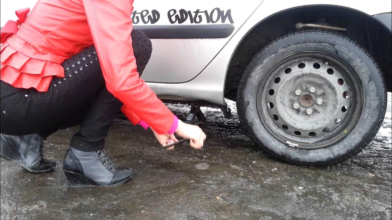 How to change car tyre in 2 minutes - YouTube