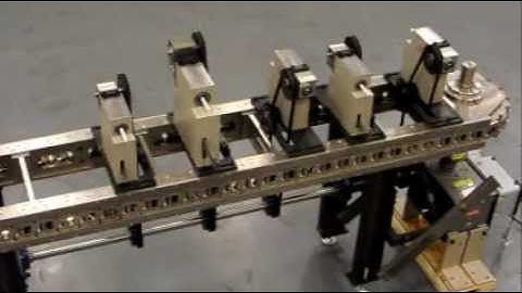 Precision Link Conveyor with Pick and Place Units - Sankyo Automation