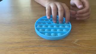 Kid Farts While Trying To Film Asmr With Fidget Toys