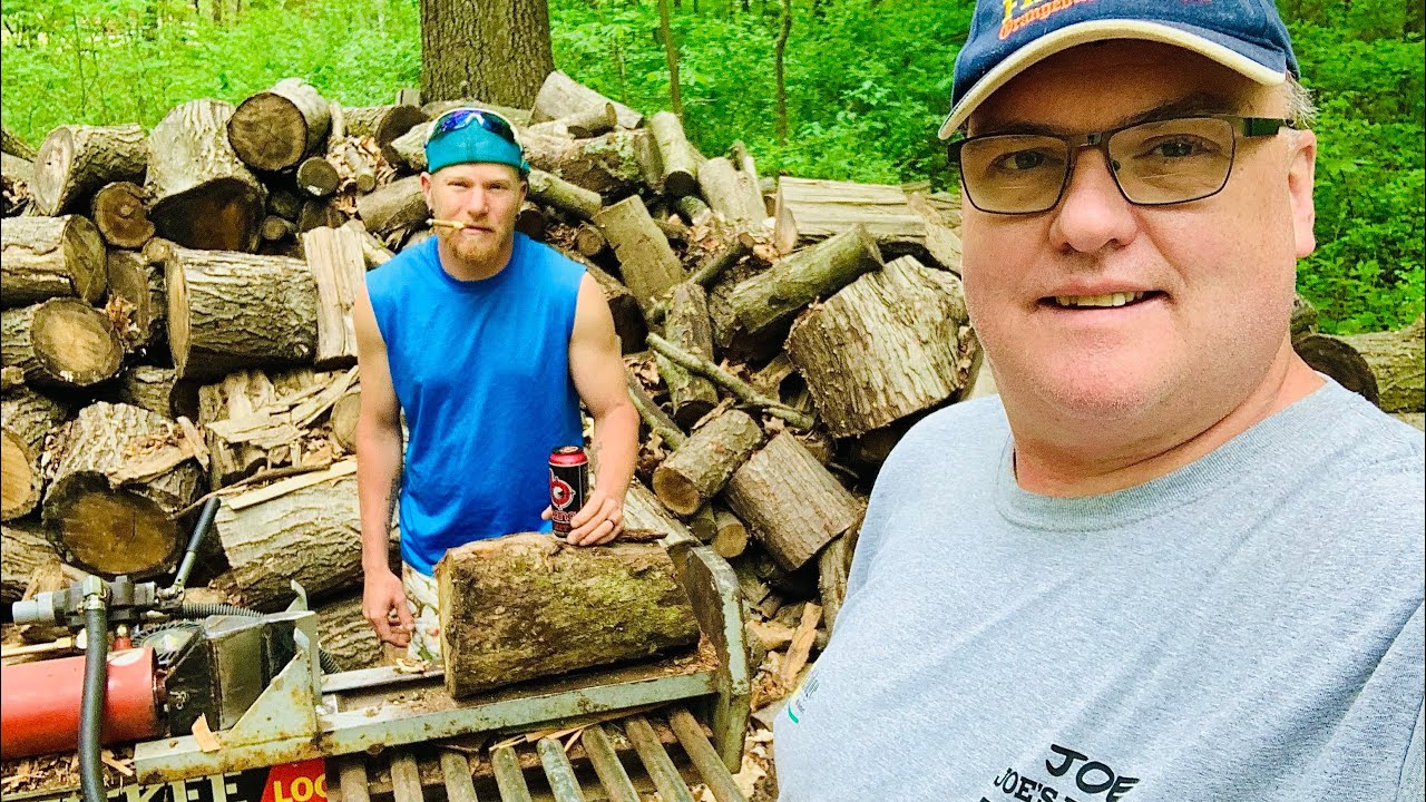 Splitting semi-seasoned firewood blocks - YouTube