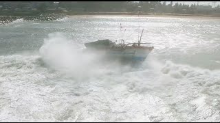 Drowning fisherman saved by surfers!