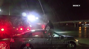 Firefighters Rescue Man Trapped In Flooding