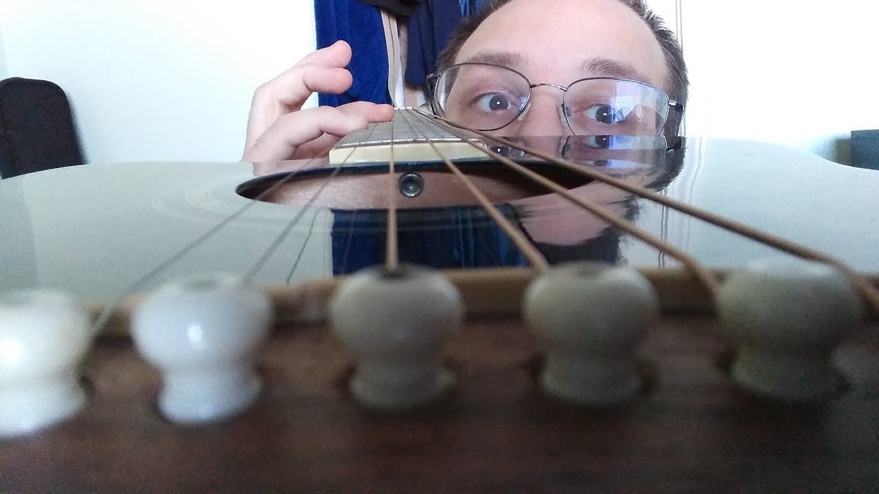 how to lower the action on your acoustic guitar YouTube