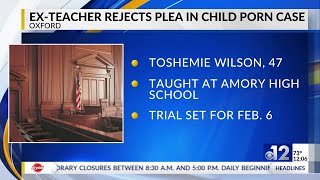 Ex-teacher rejects plea in child porn case, fires lawyers