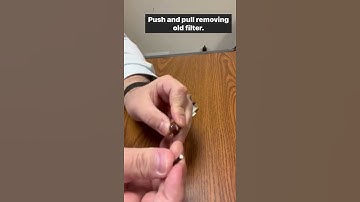 How do I change the filter on my custom Signia hearing aids?