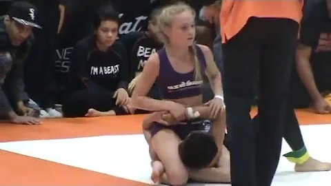 Izabella Frezzo Defeats boy at Grappling Industrie...