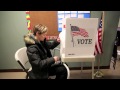 Voters cast their ballots in Downers Grove