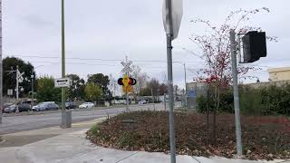 Southbound Green Line VTA Light Rail crosses Bascom Avenue